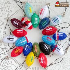 crocheted football keychains arranged in a circle