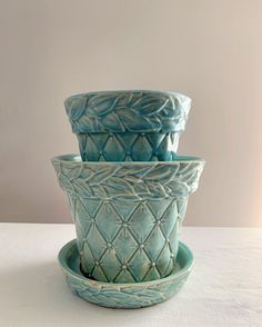 three ceramic bowls stacked on top of each other