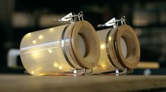 there are two jars that have lights in them