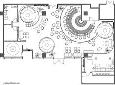 the floor plan for a restaurant with seating and tables, including an open kitchen area