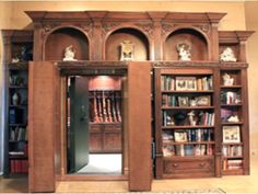 an open bookcase with many books in it