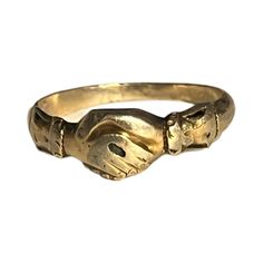 The Fede Ring Has A Long History Dating Back To Antiquity. The Major Hallmark Of This Type Of Ring Is The Motif Of Two Hands Traditionally One Female And The Other Male, Clasped Together. Known From The Original Italian “Mani In Fede” (Hands In Faith And Trust), This Style Of Ring Was Popular During The Renaissance And Given As A Token Of Betrothal. This 15ct Gold Ring Dates From Around 1820. A Charming And Rare Ring. Great Condition Ring Size 6 Antique Hallmarked Jewelry For Promise, No Brand, Types Of Rings, Womens Jewelry Rings, Jewelry Branding, Antique Jewelry, Gold Rings, Ring Size, Women Jewelry