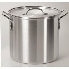 a stainless steel stock pot with lid on a white background, ready to be used for cooking