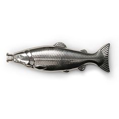 a fish shaped metal object on a white background