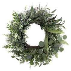 a green wreath with white flowers and greenery