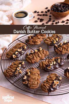 coffee flavored danish butter cookies are on a cooling rack with chocolate chips and nuts