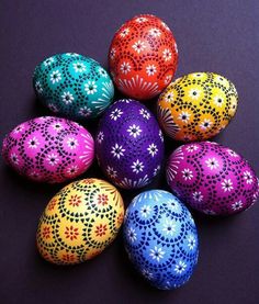 colorful easter eggs with intricate designs on them