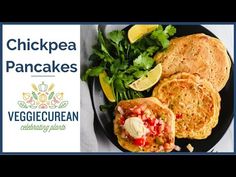 a plate with pancakes and vegetables on it next to a sign that says chickpea pancakes