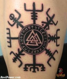 an image of a tattoo with symbols on it