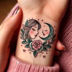 a woman's wrist tattoo with a crescent and roses on it