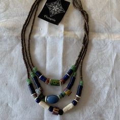 Handmade By Santa Fe Artist Terry Hawn. Beautiful Triple Strand Necklace Made From Antique African Trade Beads. The Beads In This One Are Gorgeous, Predominantly Greens And Blues. Rhodochrosite Necklace, Sodalite Necklace, Multi Necklace, Red Beaded Bracelet, African Trade Beads, Amulet Necklace, Mother Of Pearl Necklace, Red Bracelets, Gold Jewelry Necklace