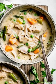 two bowls filled with turkey pot pie soup