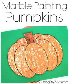 a paper pumpkin cut out with the words marble painting pumpkins on it's side