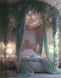 a canopy bed is decorated with flowers and greenery for a romantic bedroom decor idea