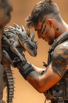 a man with tattoos on his face and arm is holding a dragon statue in front of him