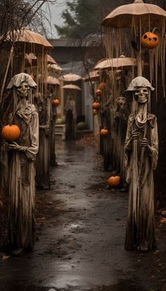 halloween decorations are lined up along a path