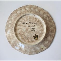 a dirty plate with writing on it