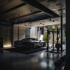 a black sports car parked in a garage