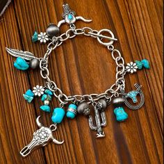 Western Bracelet Turquoise Silver-Tone Adorned With Southwestern Charms: Cactus Long-Horn Cows Or Cattle, Feather, Horse Shoe, Flowers, Stones, Crystals. Super Cute Boho Western Flair. Size Is Adjustable. New. **New Never Worn** If You Need Several Just Ask Me. Country Jewelry Bracelets, Country Western Jewelry, Horse Shoe Flowers, Diy Western Jewelry, Country Accessories, Western Bracelets, Long Horn, Jewelry Western, Cowgirl Accessories