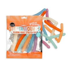 six different colored straw worms in plastic packaging