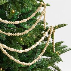 a close up of a christmas tree with ornaments on it