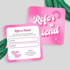 two pink refer cards sitting next to each other with green leaves on top of them