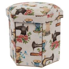 an upholstered storage box with sewing machines on the front and floral designs on the back