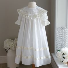 This Gorgeous Heirloom Strasburg Dress Is A Gem! The Tea Length Float Dress Made Of Cotton Lawn Has Beautiful Detailing. The Detail On This Strasburg Dress Has Intricate Embroidery And Piping Trim Around The Collar. The Large Round Collar Is Trimmed In A 2 Inch Ivory Satin Ruffle And Has Ivory/Ecru Hand Embroidered Floral Fines That Wrap The Entire Span Of The Collar, Front To Back. The Puff Sleeves Have A Matching Satin Ruffle Trim And Are Elbow Length. Two Bands Of Matching Satin Ribbon Adorn The Skirt. Upper Button Back. Worn One Time For 20 Minutes For Studio Portraits, These Dresses Are In A Like-New Condition. Generous Sizing Allows Room For Growth. Great For Special Occasions, Portrai Float Dress, Heirloom Sewing, Studio Portraits, Ruffle Trim, Kids' Dresses, Dress Making, Puff Sleeve, New Color, Like New