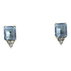 Beautifully made costume clip earrings with faceted emerald cut blue glass accented with 3 round shaped clear crystals on the bottom. No posts/ clip on earrings    Due to the unique nature of this product, all sales are final. This item is not eligible for the standard Chairish return policy. Blue Emerald Cut Earrings For Formal Occasions, Blue Emerald Cut Earrings For Gift, Formal Blue Earrings With Gemstone Accents, Blue Gemstone Accented Earrings For Formal Events, Blue Gemstone Accented Earrings For Formal Occasions, Blue Gemstone-accented Earrings For Formal Occasions, Made Costume, Aquamarine Crystal, Unique Nature