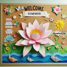 a bulletin board decorated with paper flowers and origami boats on the water's surface