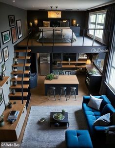 a living room filled with furniture next to a staircase leading up to a loft bed