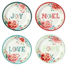 four plates with floral designs and the words joy, love, hope on each plate