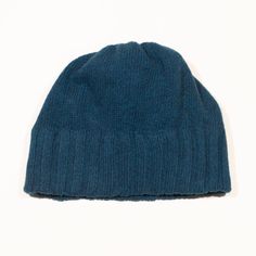 a blue hat on a white background