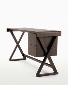 a wooden desk with a drawer on it's side and an x - leg base