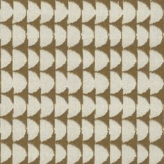 a brown and white pattern on fabric