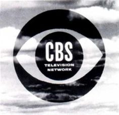 the television network logo is shown in this black and white photo with clouds behind it