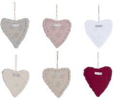 six heart shaped bibs hanging from strings