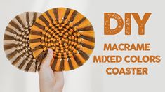 a hand holding up a yellow and brown striped pinwheel with the words diy macrame mixed colors coaster