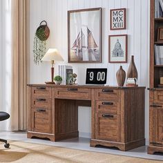 a wooden desk sitting in front of a book shelf filled with books and other items