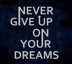 a poster with the words never give up on your dreams written in white letters against a dark background