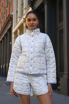 Made from recycled fabric, our lightweight Amelia Quilted Jacket features our original Blue Toile print. Designed as a convertible piece, the Amelia Jacket can be worn as-is or turned into a vest by removing the sleeves. Off-white base with baby blue florals Soft matte quilted fabric  Removable sleeves and functional f Quilted Jacket Outfit, Femininity Style, Elevated Fashion, Toile Print, Removable Sleeves, Blue Toile, Blue Florals, Black Femininity, Quilted Fabric