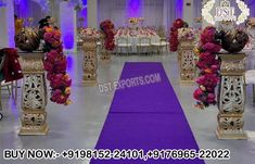 an image of a wedding venue setting with purple carpet