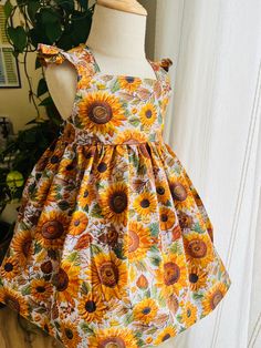 Handmade 100% cotton lightweight dress. 3D  Sunflowers embroidered flowers print (not real embroidered)  Just perfect for spring and summer. This dress are carefully made to order.  Dress is fully  lined with back elastic band that provides the perfect fit on any girl between the chosen sizes. Skirt lining has a delicate lace touch around the hem.  Pictures have been taken using a petticoat skirt to show the dress's skirt full extent! Handmade Girls Dress, Petticoat Skirt, Skirt Lining, Cotton Dress Summer, Flowers Print, Lightweight Dress, Sunflower Print, Dress Girl, Dress Cotton