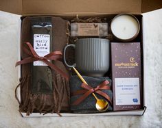 an open box containing coffee, tea and other items