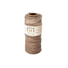 a roll of brown twine on a white background