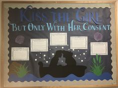 a bulletin board with an image of a man and woman kissing