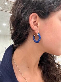 Amplify your earring collection with the Jarol Abstract Hoop. This unique stunner features a perfectly imperfect hoop in a beautiful royal blue. 1 1/2 " 18k plated with an enamel coating Made to last Water & tarnish resistant Blue Hypoallergenic Hoop Jewelry, Trendy Blue Enamel Jewelry, Hypoallergenic Blue Hoop Jewelry, Blue Metal Hoop Earrings, Bold Blue Drop Earrings, Elegant Blue Hoop Earrings For Everyday, Trendy Blue Small Hoop Earrings, Modern Blue Hoop Jewelry, Modern Small Blue Hoop Earrings