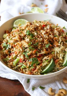 a white bowl filled with rice and vegetables