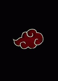 a black background with a red and white cloud in the center on top of it