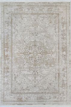 an antique style rug in beige and white colors with a large square design on the center